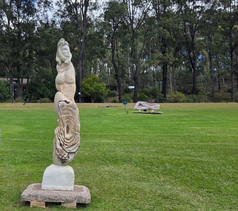 Love Comes Softly, a carved stone sculpture by Antone Bruinsma