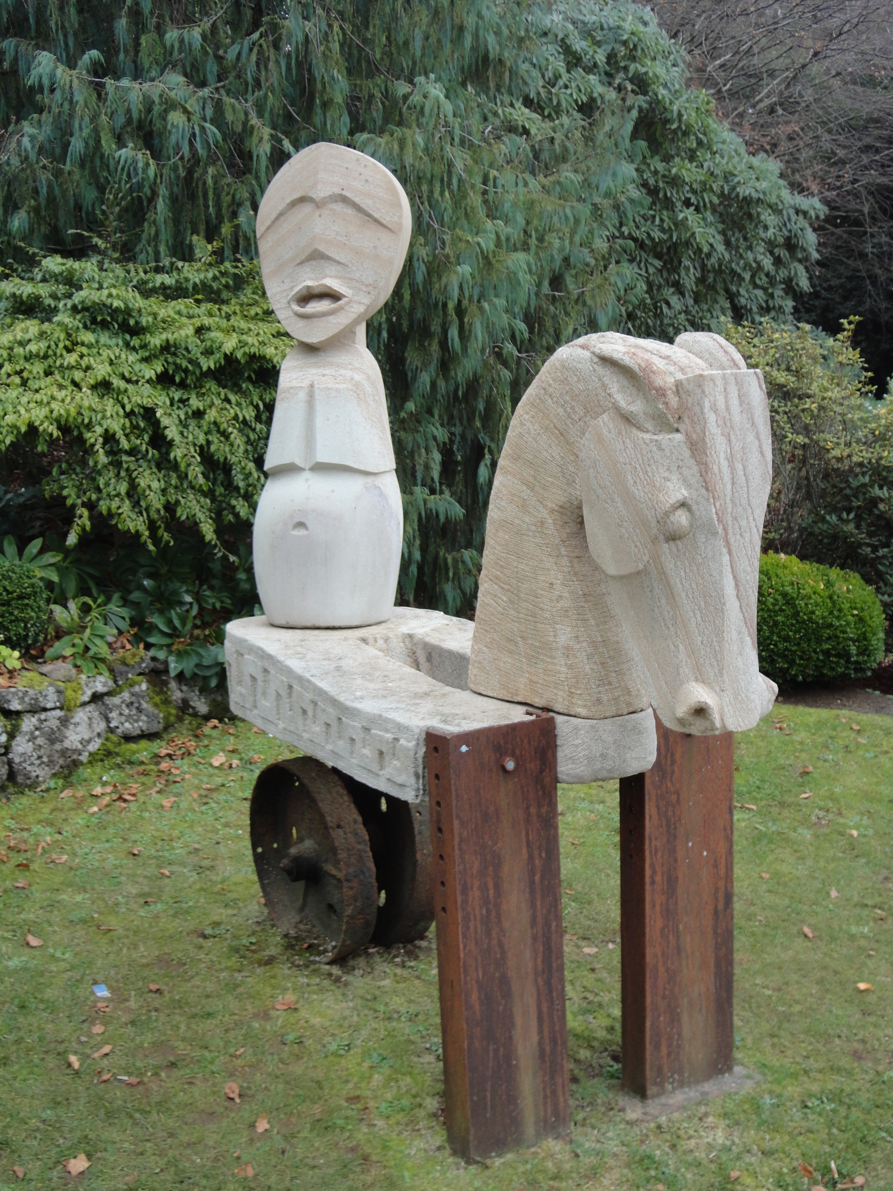 Helidon freestone and iron sculpture by Antone Bruinsma of horse and charioteer